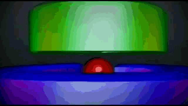 a red ball is in the middle of a blue circle