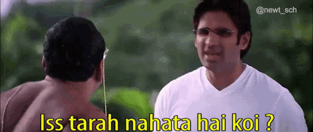 a man talking to another man with the words iss tarah nahata hai koi
