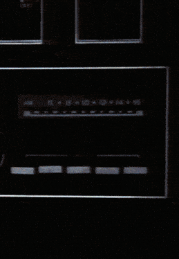a close up of a person 's hand on a dark background