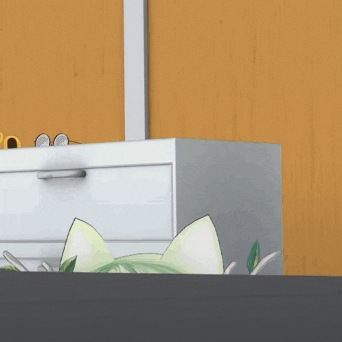 a white dresser has a pink flower on the wall behind it