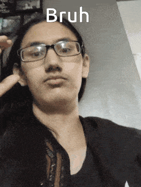 a woman wearing glasses has the word bruh above her