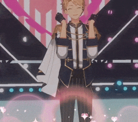 a man in a military uniform is standing on a stage with his arms in the air .
