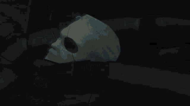 a man with a patch on his eye is laying down with the words " do you know what day it is today " below him