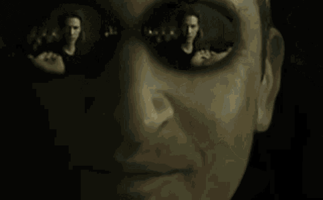 a person is holding two pills in their hands in their hands .