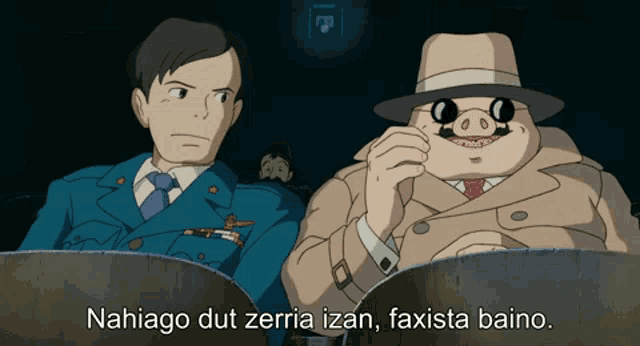 two men and a pig are sitting next to each other with the words nahiago dut zerria izan faxista baino