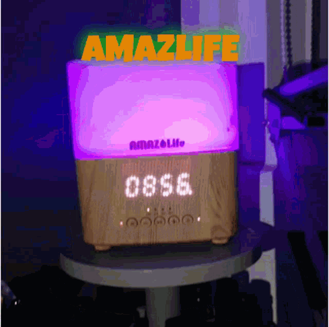 a wooden box with a purple light and the word amazlife on it