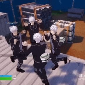 a group of people are standing on top of a roof .