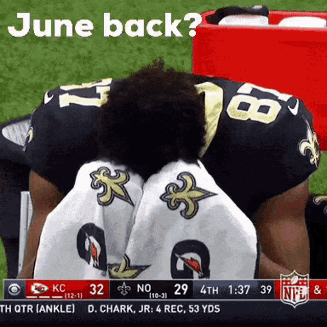 a football player with the number 16 on his jersey is kneeling down