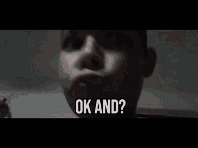 a close up of a person 's face with the words " ok and " written below it