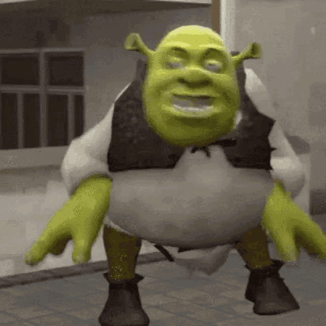 shrek is a cartoon character from the movie shrek and is dancing on the street .