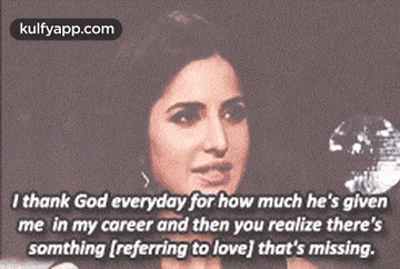 a woman is crying and talking about how much god has given her in her career .