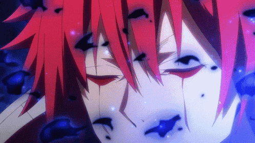 a close up of a person with red hair and black eyes