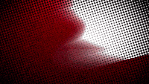 a red and white background with dots and a swirl
