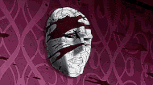 a statue of a face with blood coming out of it
