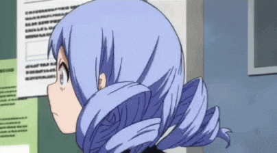 a girl with blue hair is standing in front of a bulletin board with papers on it .