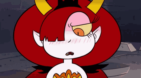 a close up of a cartoon character with horns and a crown on her head