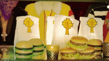 a bunch of mcdonald 's hamburgers on a shelf