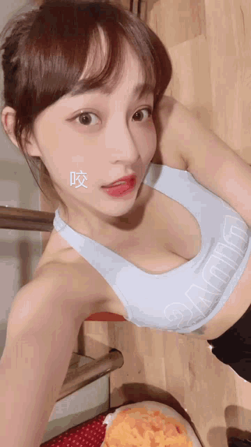 a woman wearing a sports bra that says ' calvin klein ' on the front