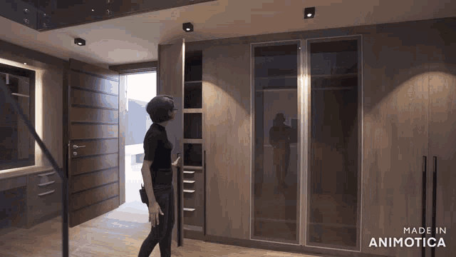 a woman is walking through a hallway with the words made in animotica on the bottom right