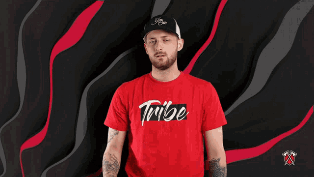 a man wearing a red t-shirt that says ' tokyo ' on it
