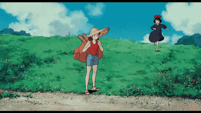 a girl in a straw hat is walking down a dirt road next to another girl