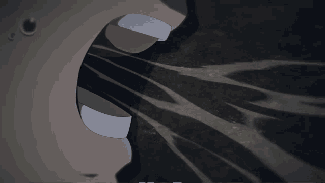 a close up of a person 's mouth with a shadow on the wall