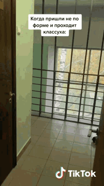 a tiktok video of a hallway with a window