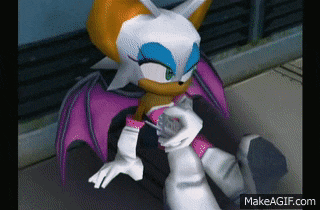 rouge the bat from sonic the hedgehog is sitting down