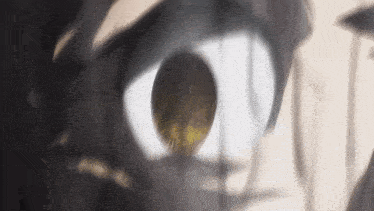 a close up of a person 's eye with a shadow on it