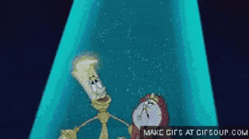 a clock and a lamp are standing next to each other in a room .