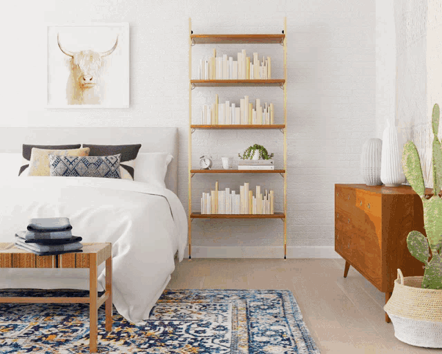 a bedroom with a bed a dresser and a bookshelf filled with books