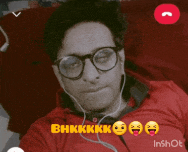 a man wearing glasses and ear buds has bhkkk written in yellow