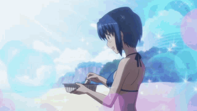 a girl in a bikini is standing on the beach