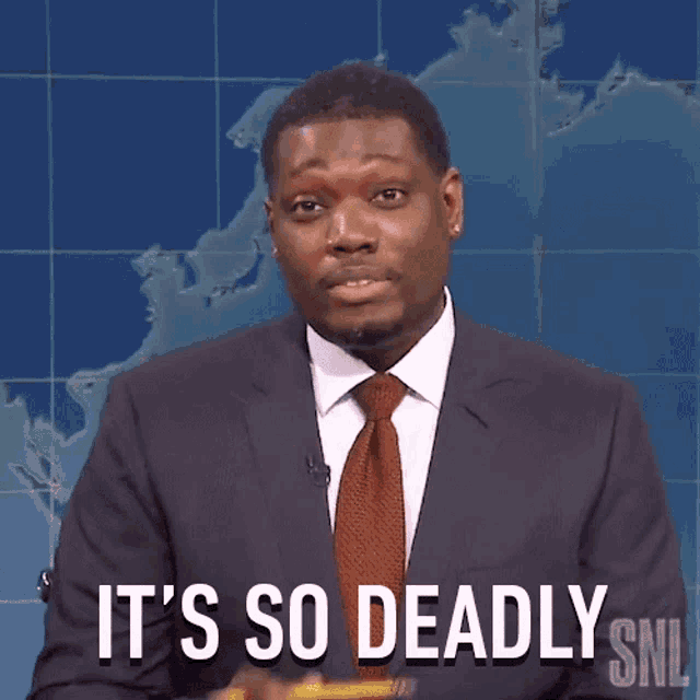 a man in a suit and tie is holding a pencil and says it 's so deadly snl