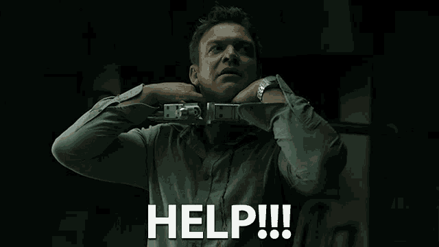 a man with a handcuff around his neck says help !!!