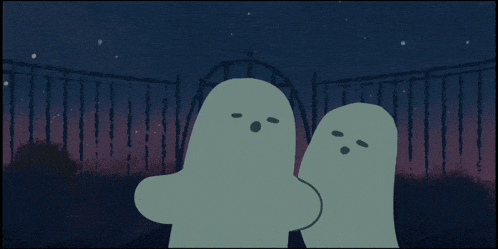 three ghosts are standing in front of a fence