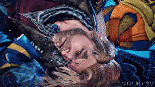 a man is laying on his back with the website gifrun.com visible behind him