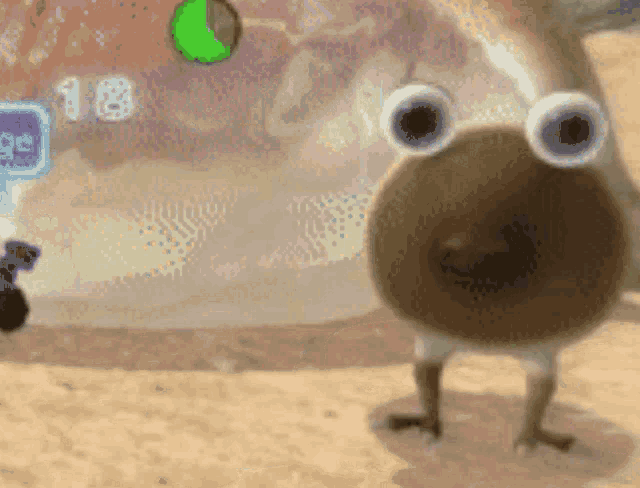 a frog that looks like a doughnut with big eyes