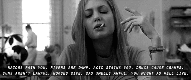 a black and white photo of a woman smoking a cigarette with a quote behind her