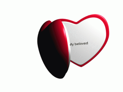 a heart shaped mirror with a picture of a man and the words my beloved on it