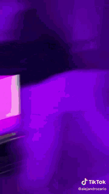 a purple background with a tiktok logo on the bottom right corner
