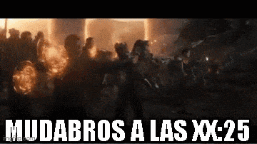 a group of people standing in front of a burning building with the words mudabros a las xx-25 written below them