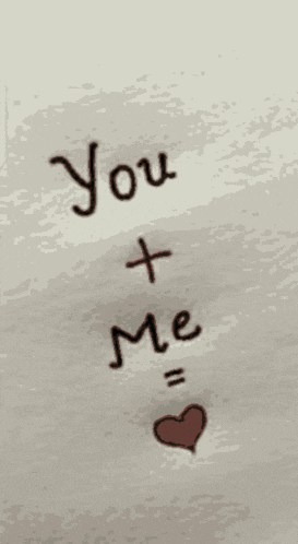 a drawing of the words you + me with a heart
