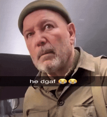 a man with a beard is wearing a hat and a trench coat with the words he dgaf on the bottom