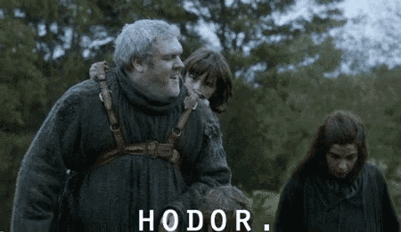 a man is carrying a child on his shoulders and the word hodor is above him