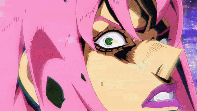 a close up of a person with pink hair and green eyes