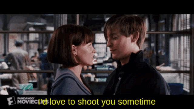 a man and a woman are looking at each other with the words love to shoot you sometime above them