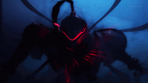 a tokyo mx logo can be seen in the corner of a dark background