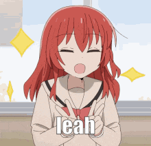 a girl with red hair is making a peace sign and the word leah is on the bottom