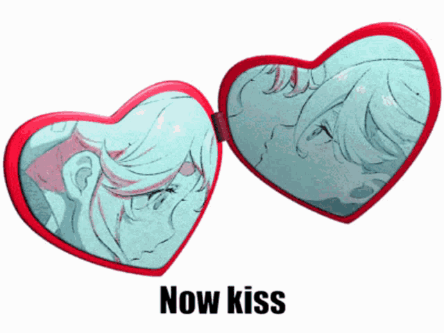 a pair of heart shaped mirrors with the words now kiss on the bottom